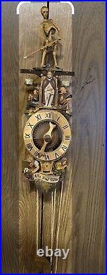 The All are Mine is by Rombach und Haas. Medieval Wood grim reaper wall clock