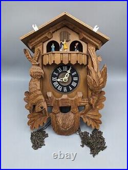 Vintage Black Forest Hunter Cuckoo Clock Hand-Carved Deer Rabbit Bird 14.5